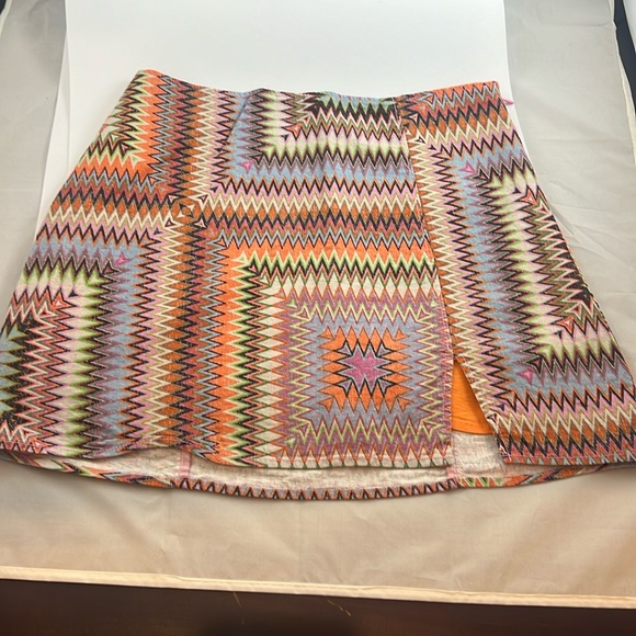 Urban Outfitters Dresses & Skirts - Urban Outfitters funky pattern skirt. Small slit in front. Size small!